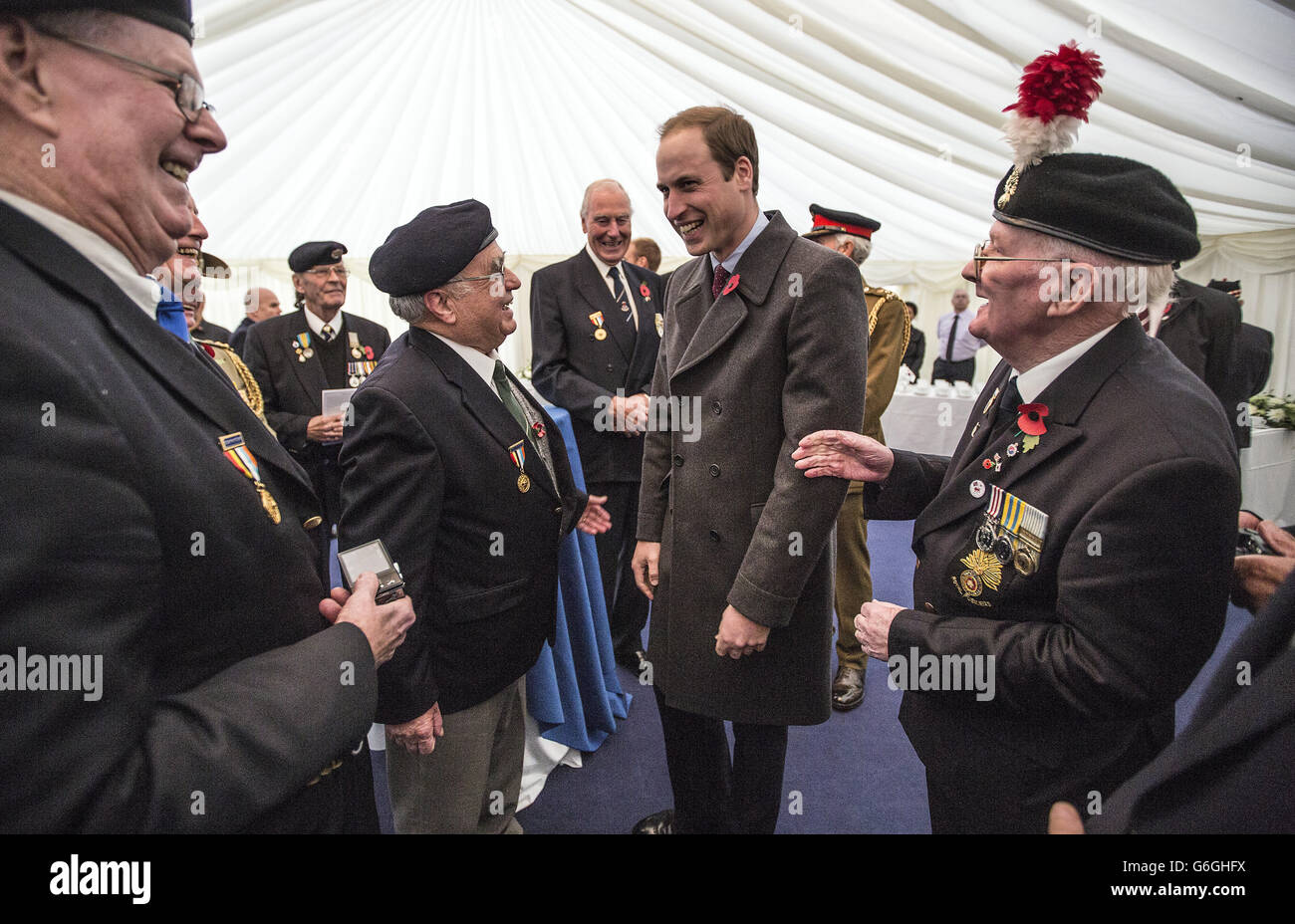 The Duke of Cambridge talks to British veterans of the Korean war following a Korean War Memorial Ground-breaking Ceremony, at Victoria Embankment Gardens in central London. PRESS ASSOCIATION Photo. Picture date: Tuesday November 5, 2013. See PA story ROYAL Korea. Photo credit should read: Richard Pohle/The Times/PA Wire Stock Photo
