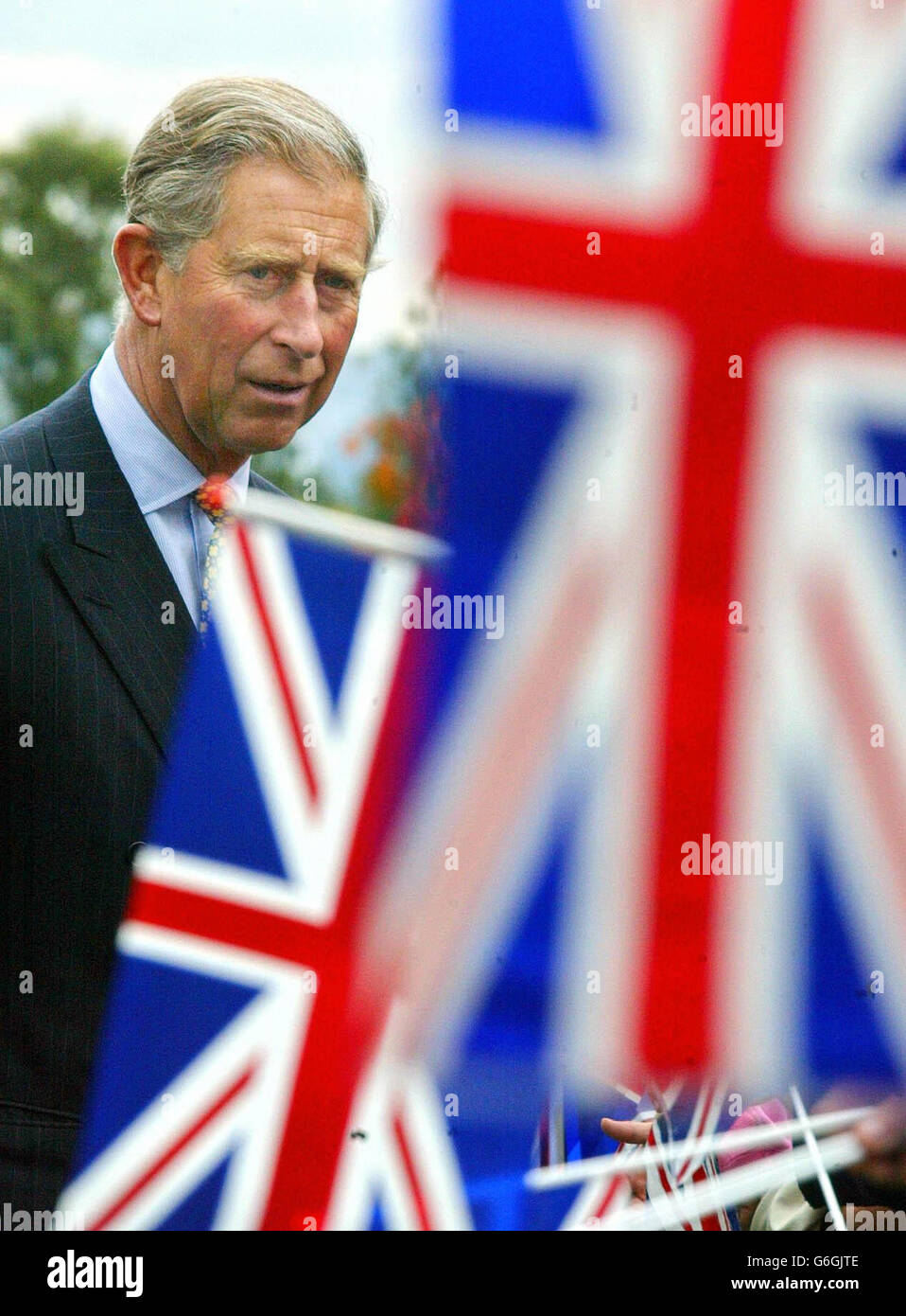 The Prince of Wales is greeted by a crowd waving Union Jacks as he officially opens Britain's first complete restoration of a Victorian glasshouse. Charles looked relaxed as he toured the pavilions at Sheffield's Botanical Gardens, which have been restored as part of a 6.6 million project. Stock Photo