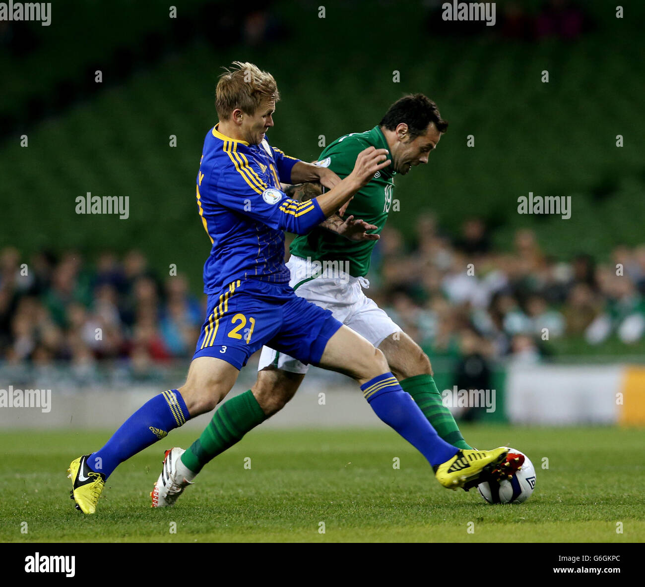 Republic of Ireland's Andy Reid (right) in action with Kazakhstan's Valeriy Korobkin during the FIFA 2014 World Cup Qualifying, Group C match at the Aviva Stadium, Dublin. Stock Photo