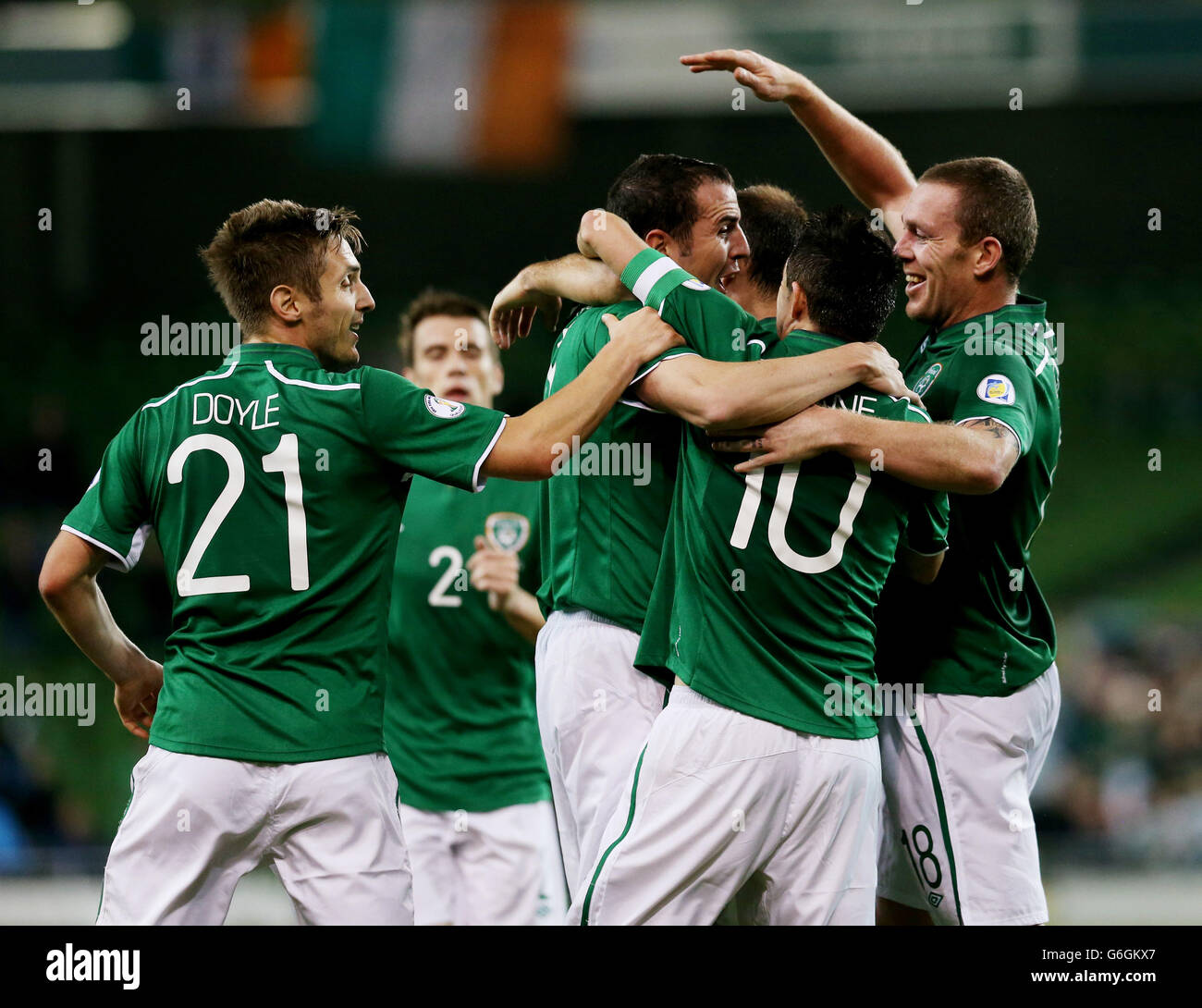 Republic of Ireland's John O'Shea (third left) celebrates with team-mates after scoring his side's second goal during the FIFA 2014 World Cup Qualifying, Group C match at the Aviva Stadium, Dublin. Stock Photo