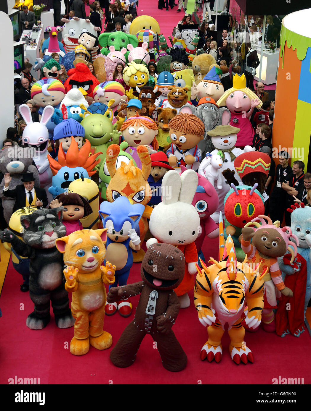 Character and mascots participating in a parade at the Brand