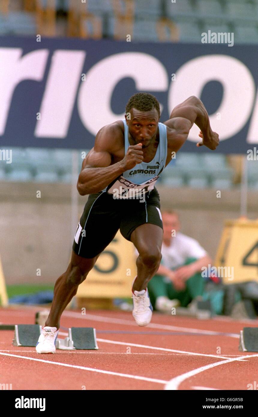 14 - Jun - 96. Athletics, British Olympic Trials. Linford Christie powers out of the blocks en route to victory in the 100m Stock Photo