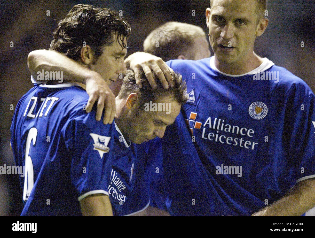 Leicester City's Paul Dickov celebrates scoring the 3rd goal with Muzzy Izzet (left) & James Scowcroft during the Barclaycard Premiership game at the City Stadium, Leicester. Final score 4 - 0 to Leicester. Stock Photo