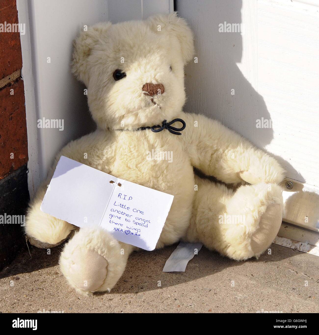 A tribute outside a house on Richmond Street in Coventry as a murder inquiry has begun after the death of a two-year-old boy who was admitted to hospital with serious head injuries. Stock Photo