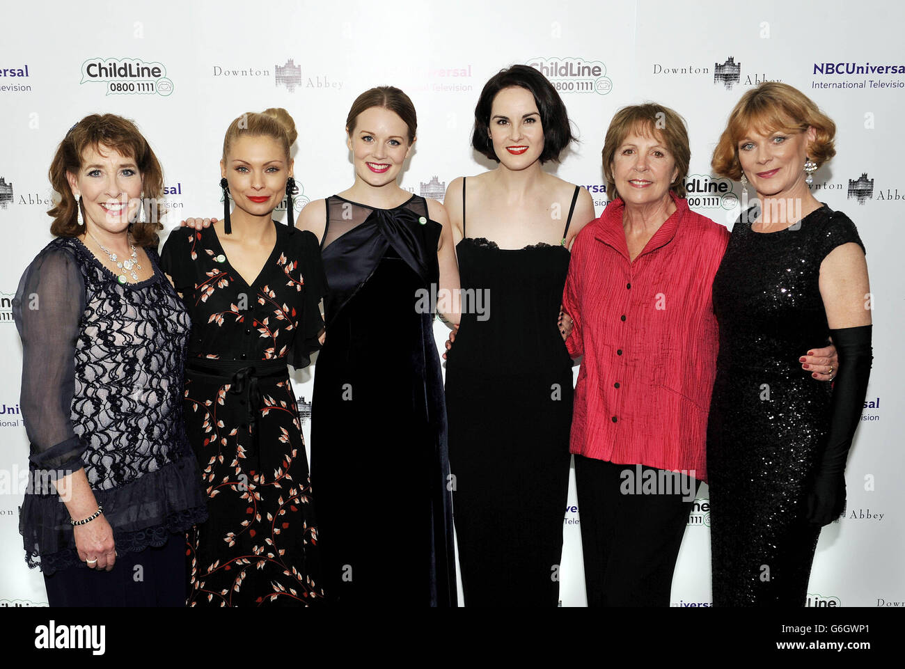 (Left to right) Phyllis Logan, MyAnna Buring, Cara Theobold, Michelle Dockery, Penelope Wilton and Samantha Bond attend the Downton Abbey themed fundraiser for the NSPCC at The Savoy Hotel, Strand, London. Stock Photo