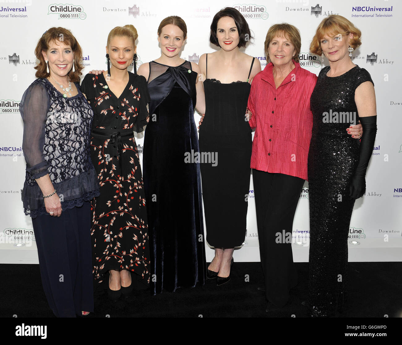 (Left to right) Phyllis Logan, MyAnna Buring, Cara Theobold, Michelle Dockery, Penelope Wilton and Samantha Bond attend the Downton Abbey themed fundraiser for the NSPCC at The Savoy Hotel, Strand, London. Stock Photo