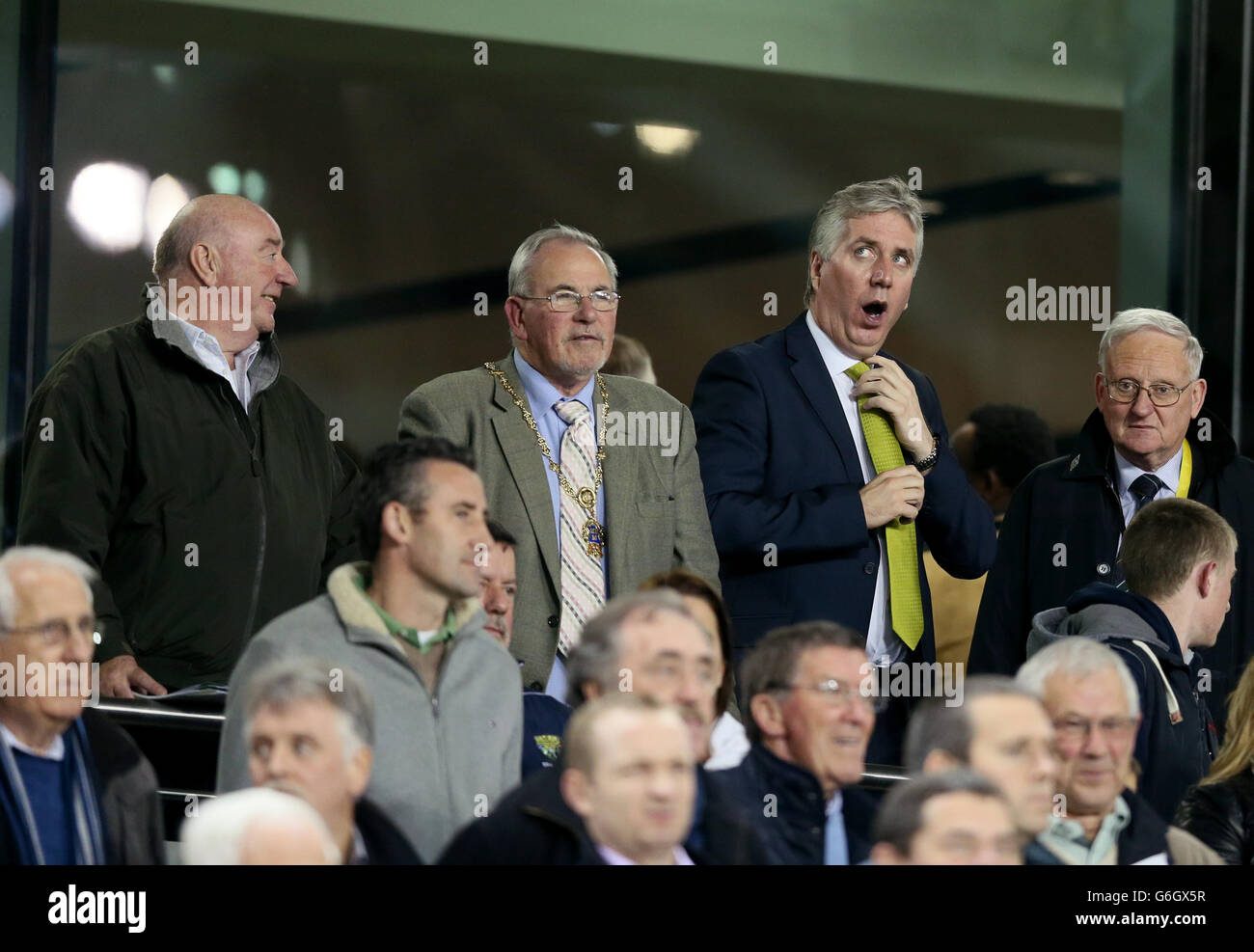 CEO of the FAI John Delaney (second from right) yawns ahead of the FIFA 2014 World Cup Qualifying, Group C match at the Aviva Stadium, Dublin. Stock Photo