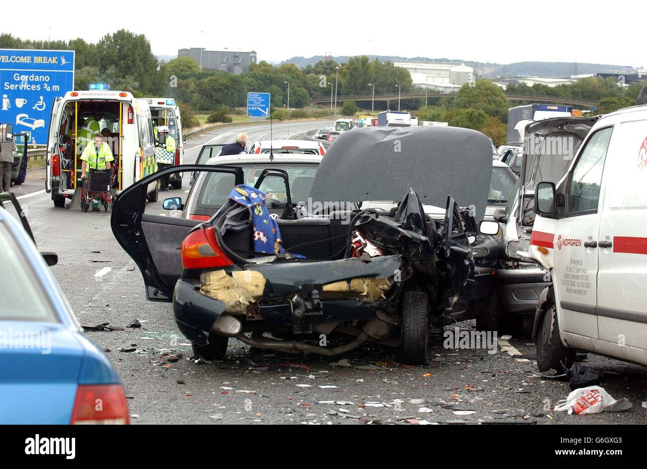 A car stands ruined after a crash involving 12 vehicles on the northbound carriageway of the M5 motorway near Bristol. Up to a dozen people were injured in the accident, which happened between junctions 20 and 19 of the motorway shortly after 1pm. The cause of the crash was not yet known, but a police spokesman said there were reports of a heavy downpour at around the time of the incident. Stock Photo