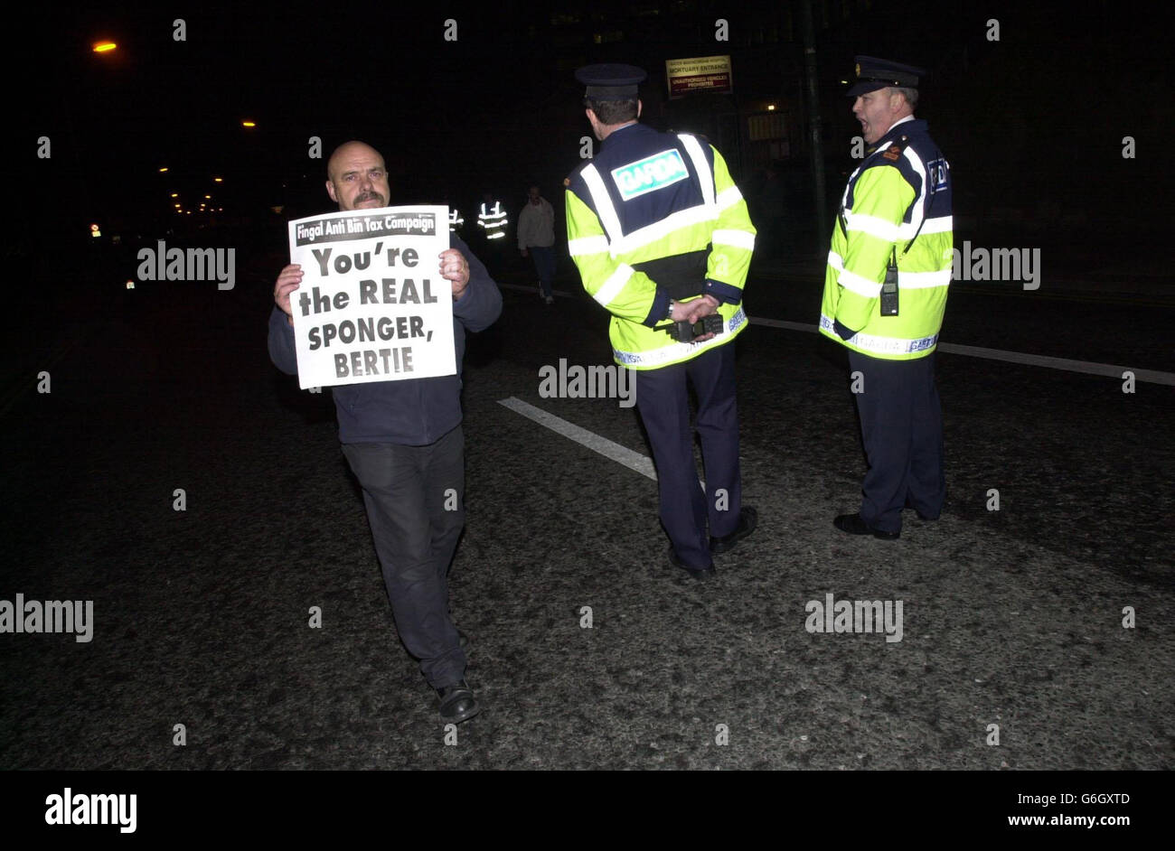An antibin charge campaigner walks away from a protest outside Mountjoy Prison, Dublin, Ireland