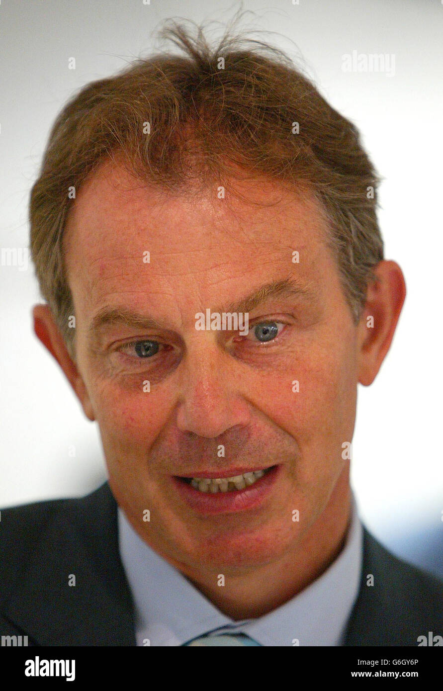 Prime Minister Tony Blair during his visit to the 60 million Golden Jubilee Wing of King's College Hospital in Denmark Hill, South London. The wing, which opened last year ahead of schedule, was built using the controversial Private Finance Initiative opposed by some unions. Asked after his visit whether he condoned Mr Campbell's behaviour over the David Kelly affair, Mr Blair told reporters: 'I totally understand why you people want to ask me about the Hutton Inquiry but let that inquiry take place. Meanwhile let us get on with doing other things, for example in the NHS here.' Stock Photo