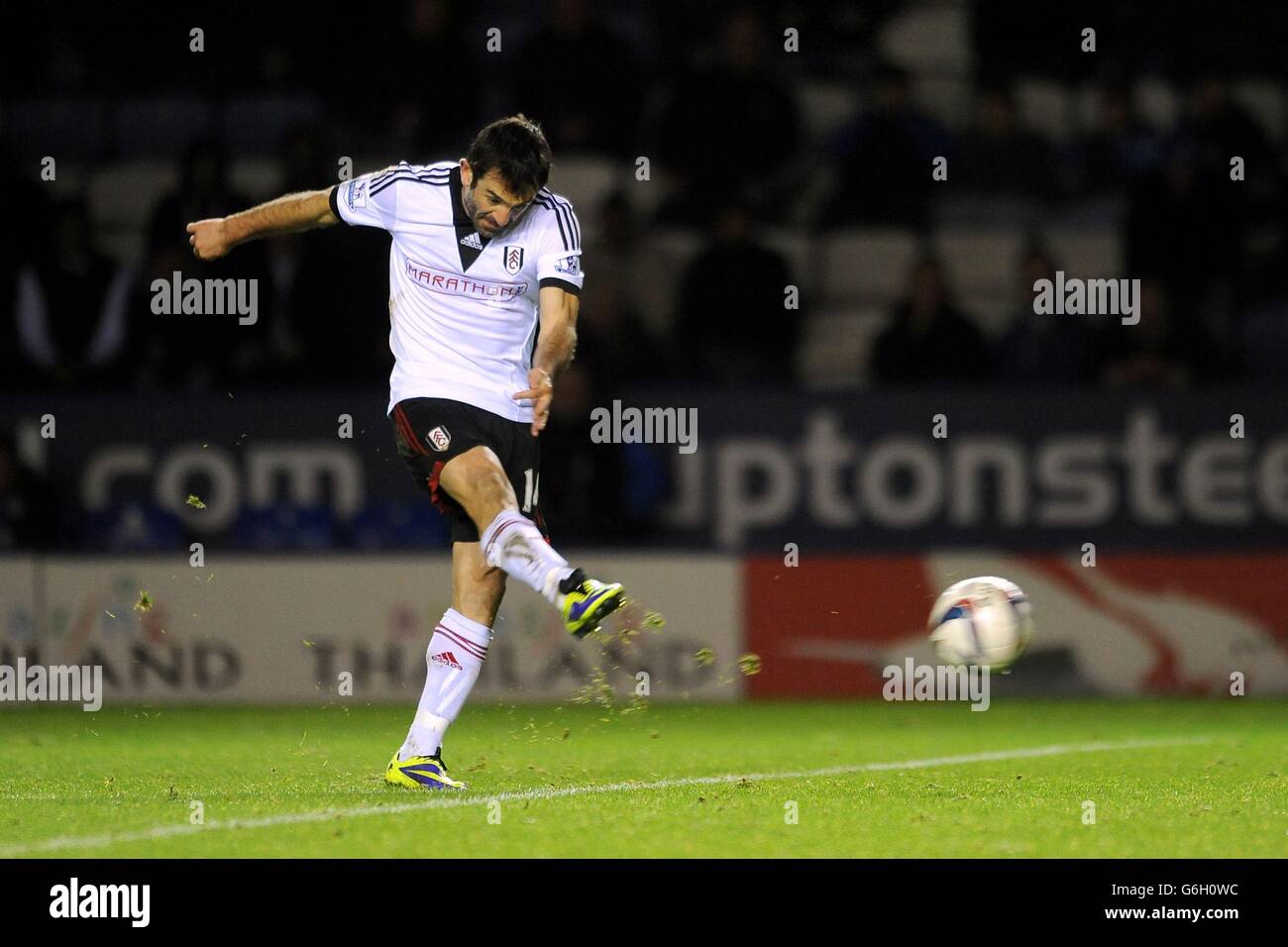 Fulham's Georgios Karagounis scores their third goal of the game during the Capital One Cup, Fourth Round match at the King Power Stadium, Leicester. Stock Photo