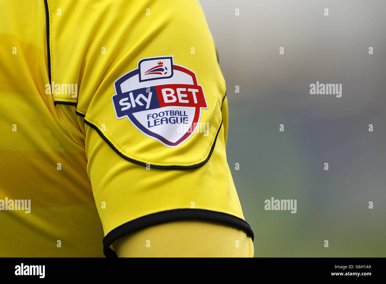 Closeup detail of The Skybet Football League logo on the linesmans arm. Stock Photo