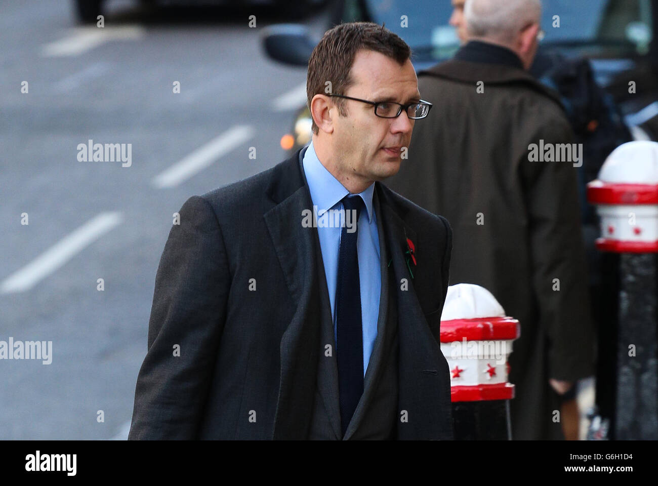 Andrew Coulson arrives at the Old Bailey in London as the prosecution