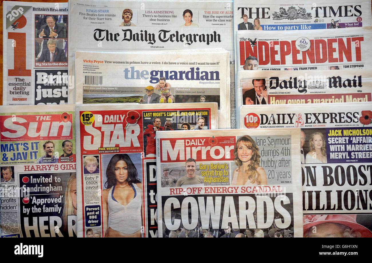 The front pages of the British national Newspapers. Newspaper publishers are considering an urgent appeal after the High Court rejected their bid to block a new cross-party royal charter to regulate the press. Stock Photo
