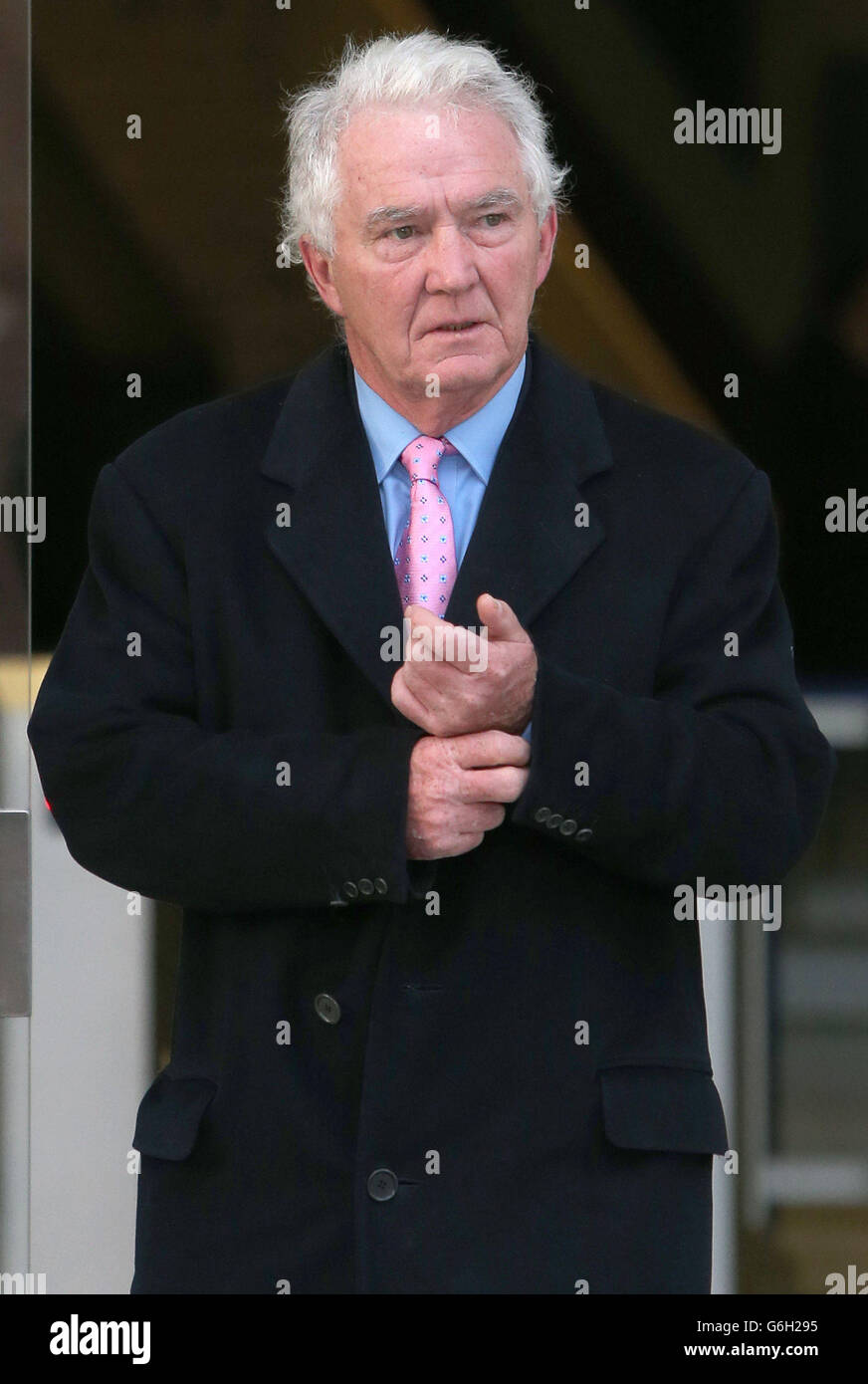 Former Anglo Irish Bank executive Sean FitzPatrick appears before the