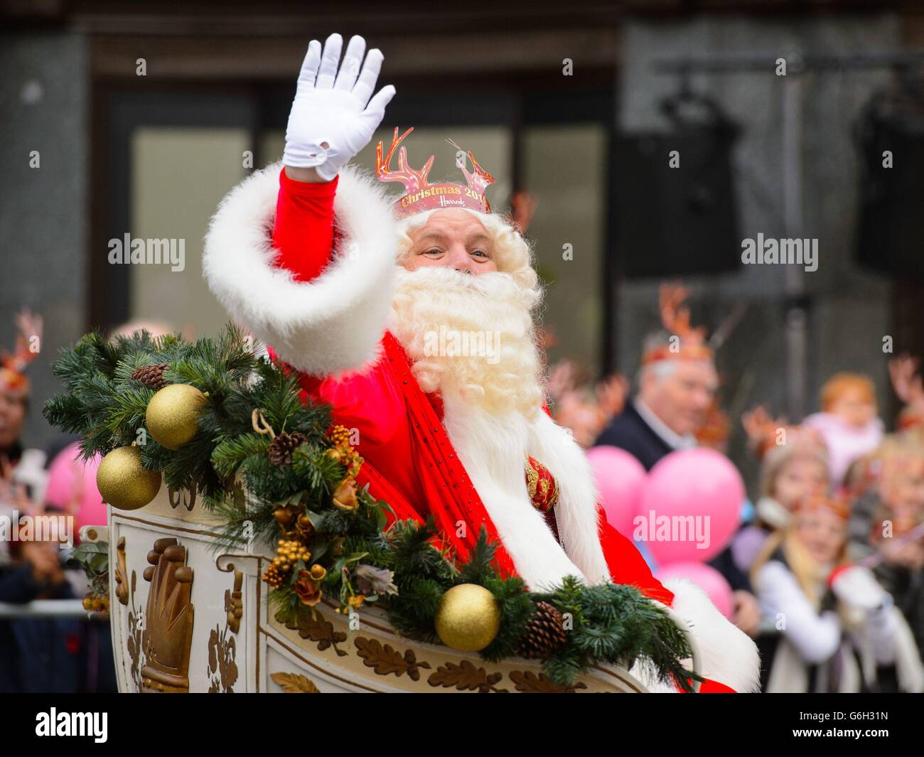 A performer dressed father christmas annual harrods christmas parade hi