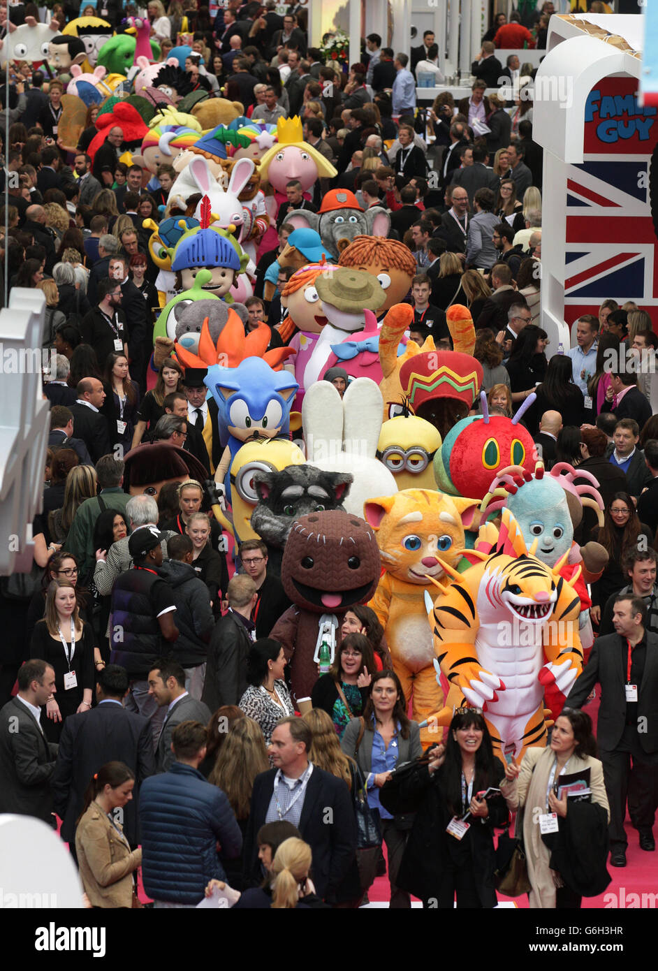 Character and mascots participating in a parade at the Brand