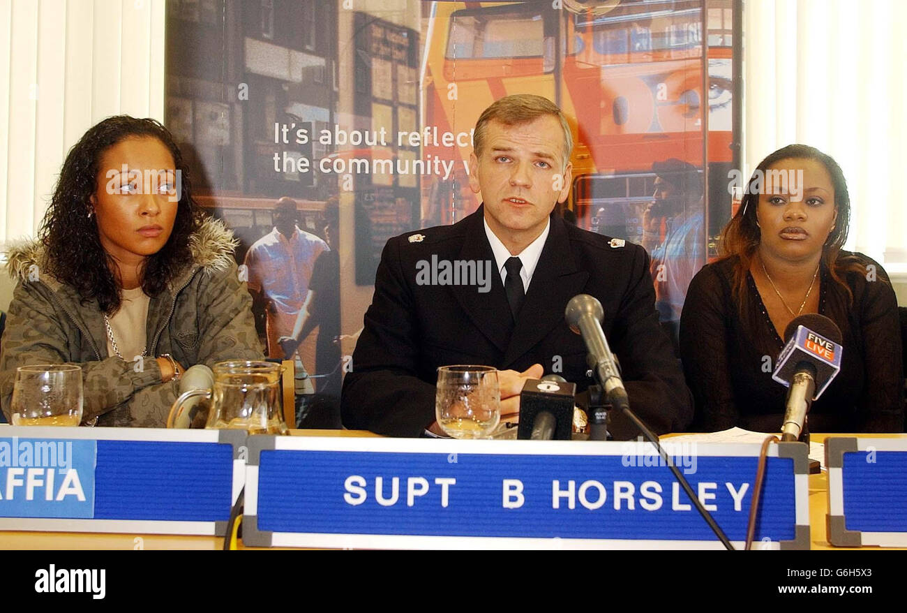 Lisa Maffia (left) a singer with the R&B band 'So Solid Crew', with Superintendent Bryan Horsley, and Asata Kijera, an aunt of Asata Budd, 13, who went missing last Monday, at a press conference at Ilford Police station, where they appealed for information as to her whereabouts. Supt Horsley of Redbridge police said: 'We have no evidence to suggest Asata has come to harm but obviously a missing 13-year-old girl is of great concern to us'. Asata is described as a light-skinned black girl, 5ft 6ins and slim, with light brown eyes and dark brown shoulder-length hair tied back. Stock Photo