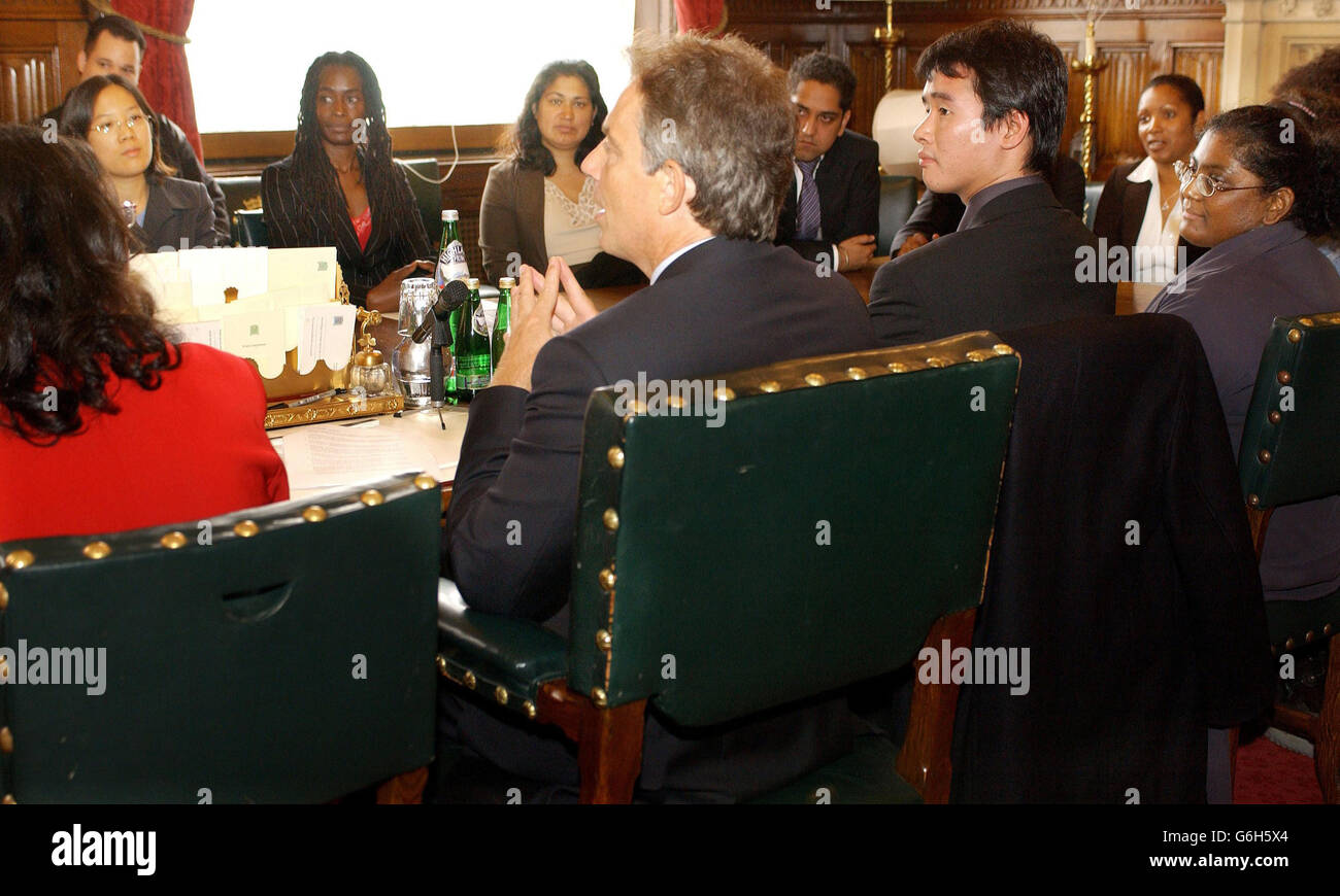 Prime Minister Tony Blair talks with members of Operation Black Vote in his House of Commons office. Young members of the group, whose aim is to encourage non-whites into politics, have been shadowing MPs as part of six month stint to prepare them for political life. Stock Photo