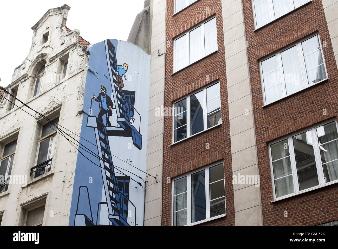 Tintin and Captain Haddock painted onto a wall on the side of a building in Brussels Stock Photo