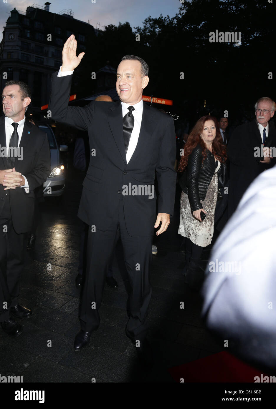 Tom Hanks at the gala screening of Saving Mr Banks, the closing film of the 57th BFI London Film Festival at Odeon Leicester Square, London. Stock Photo
