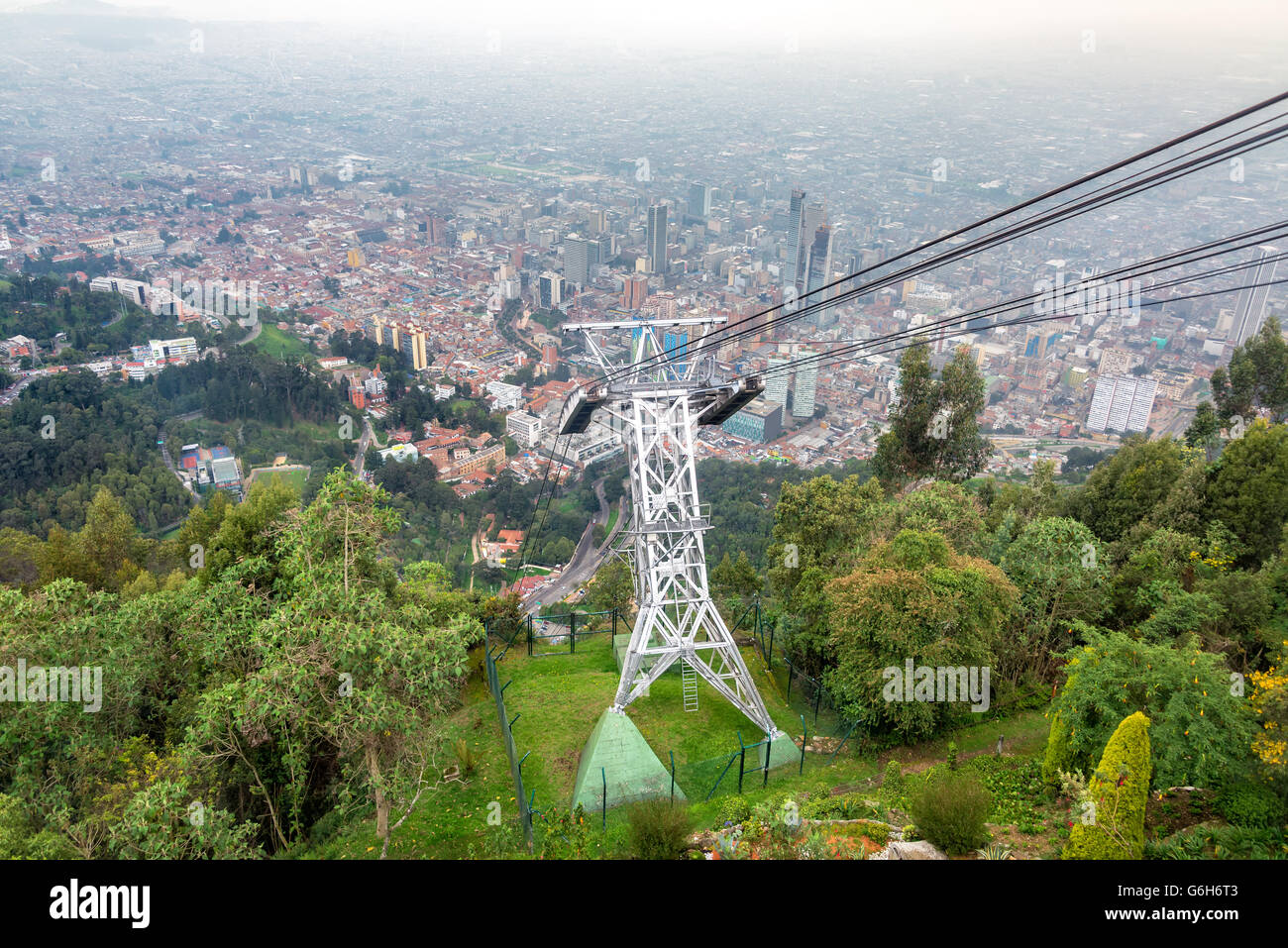 Aerial tramway leading up to Monserrate Mountain with Bogota, Colombia in the background Stock Photo