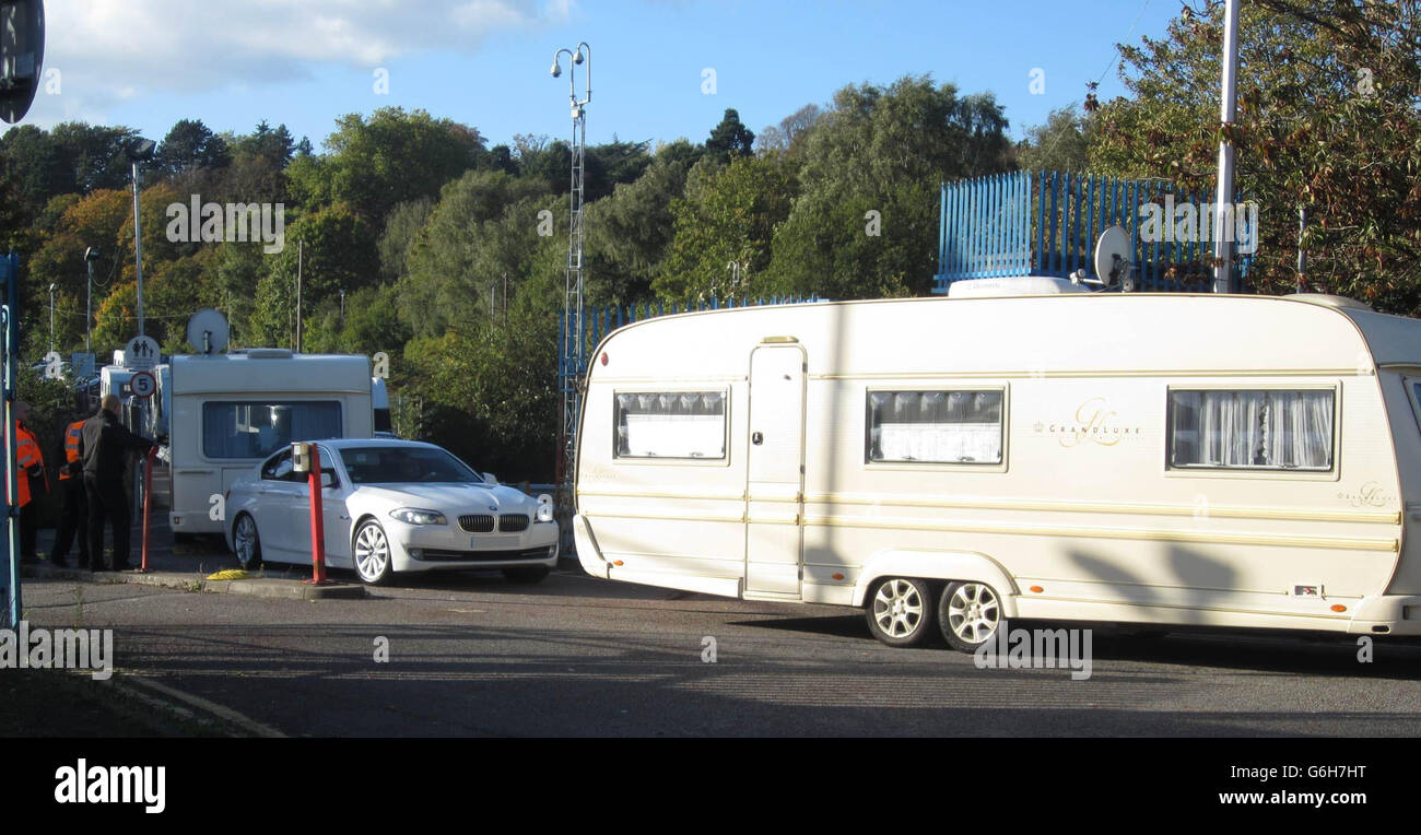 EDITORS NOTE NUMBER PLATE PIXELATED BY PA PICTURE DESK. Cars towing caravans leave the Royal Gwent Hospital in Newport, south Wales as a group of French travellers left the hospital car park they were using as a make-shift encampment. Stock Photo