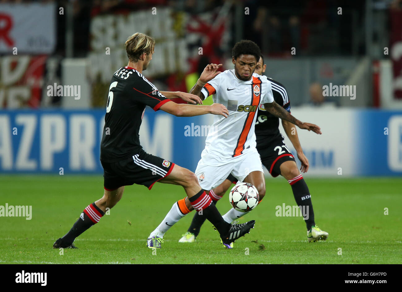 BayArena Leverkusen Germany ,15th February .2014, Football Bundesliga  Season 2013/14, matchday 21, Bayer 04 Leverkusen - Schalke 04 1:2 ---  Klaas-Jan Huntelaar (S04) shows his teeth, Leverkusens Simon Rolfes, Stefan  Kie§ling (Kiessling)