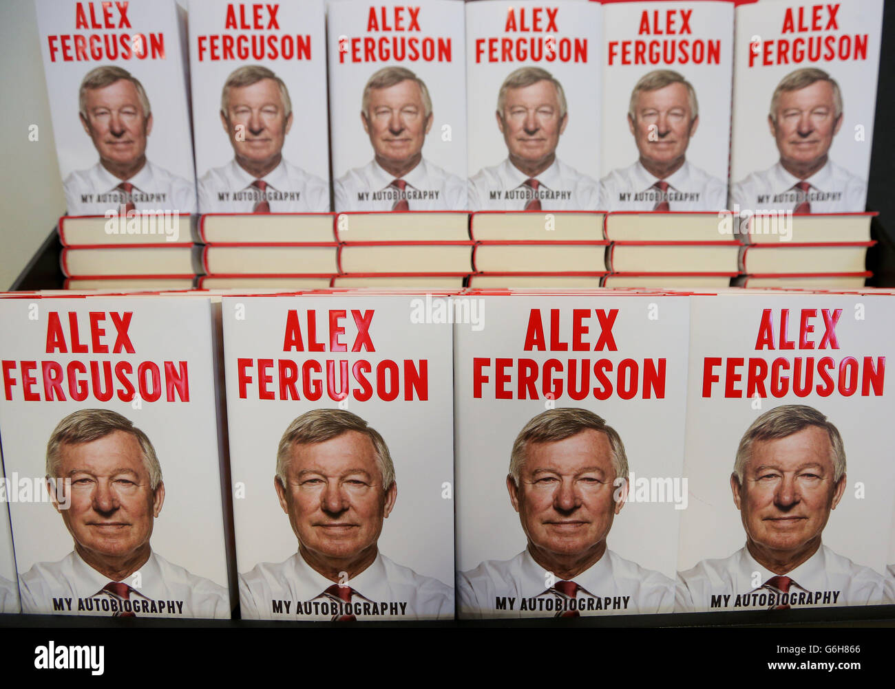 Store staff get books ready for sale ahead of a Sir Alex Ferguson signing  session at the Stretford Tesco Extra, Manchester Stock Photo - Alamy