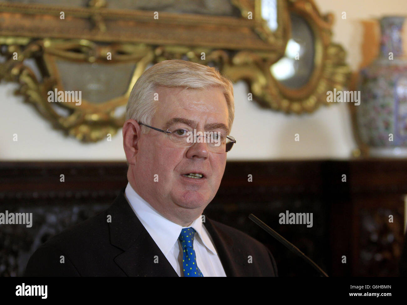 RETRANSMITTED WITH CORRECTION ON BYLINE Tanaiste and Minister for Foreign Affairs and Trade, Mr Eamon Gilmore TD during a press conference with former US Diplomat Dr. Richard Haass at the Department of Foreign Affairs on St. Stephen's Green, in Dublin. Stock Photo