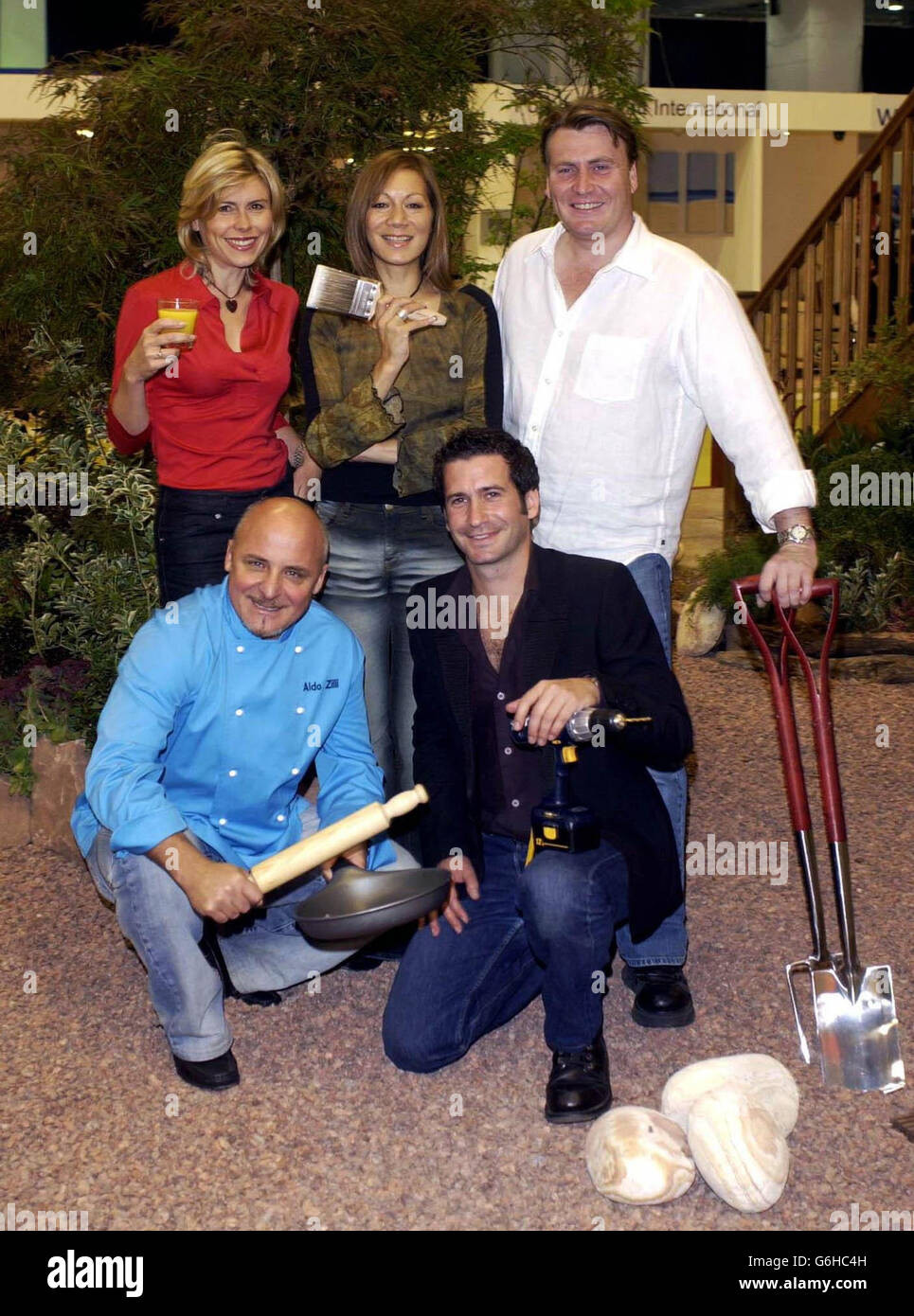 Celebrities (from left to right) Amanda Ursell, Aldo Zilli, Oliver Heath, Anna Ryder Richardson and David Domoney during a photocall to launch the Autumn Ideal Home Show 2003 at Earls Court in London. The exhibition will run from 3 - 12 October 2003 and launches in conjunction with the first national Love Your Home Week. Stock Photo