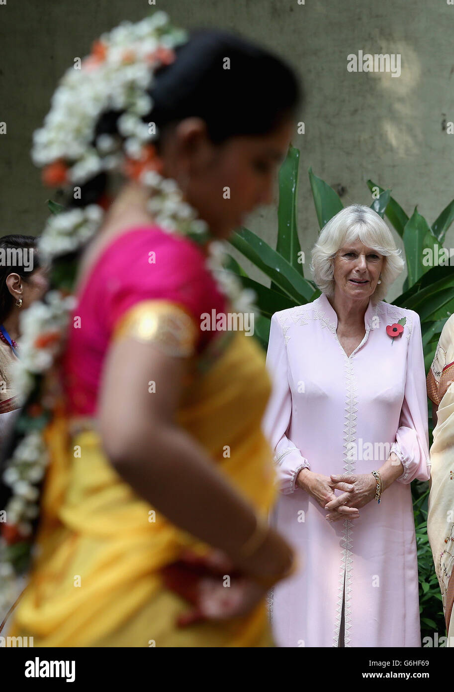 The Duchess of Cornwall watches dancers at Asha Sadan (House of Hope) for children who have been abandoned or abused, in Mumbai, on the fourth day of their official visit to India and Sri Lanka. PRESS ASSOCIATION Photo. Picture date: Saturday November 9, 2013. See PA story ROYAL Tour. Photo credit should read: Chris Jackson/PA Wire Stock Photo