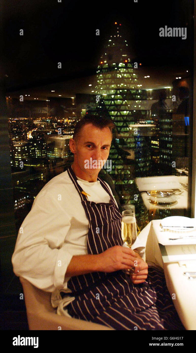 Chef Gary Rhodes enjoys a glass of champagne during the launch of his restaurant Rhodes Twenty Four located on the 24th floor of the City of London's most impressive and tallest building Tower 42 on Old Broad Street. Rhodes promises to bring back traditional British Cuisine in an outstanding location, with its stunning views across the capital. Stock Photo