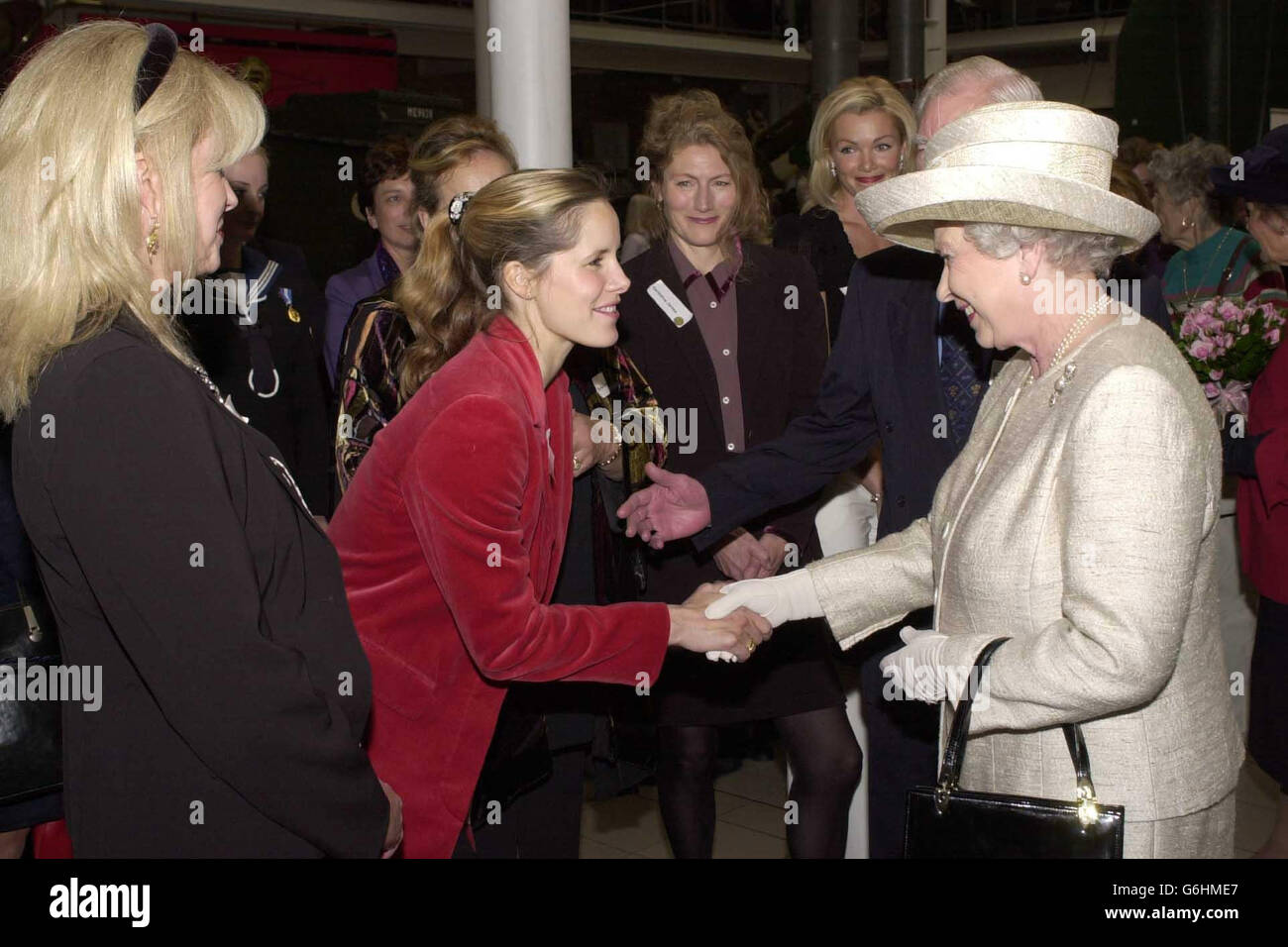 Britain's Queen Elizabeth II meets ballerina Darcy Bussell at the Women in War exhibition at the Imperial War Museum, London. * The Queen was reunited with a group of wartime friends at the event as she relived her memories of joining the services during the Second World War. No230873 Second Subaltern Elizabeth Alexandra Mary Windsor, as she was known in 1945, met six fellow former members of the Auxiliary Territorial Service. The women trained together with the teenage Princess at a three- week driving and mechanics course in Camberley, Surrey. Stock Photo