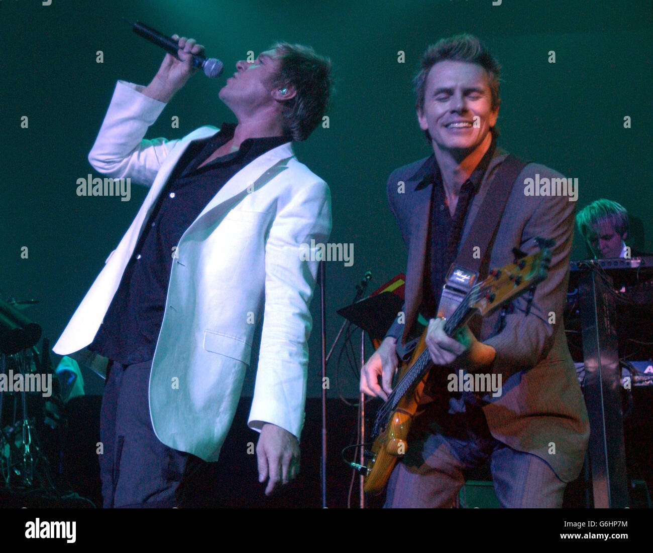 Lead singer Simon Le Bon (left) and John Taylor from Duran Duran performs live on stage for their first UK concert in 18 years at The Forum in London. Stock Photo