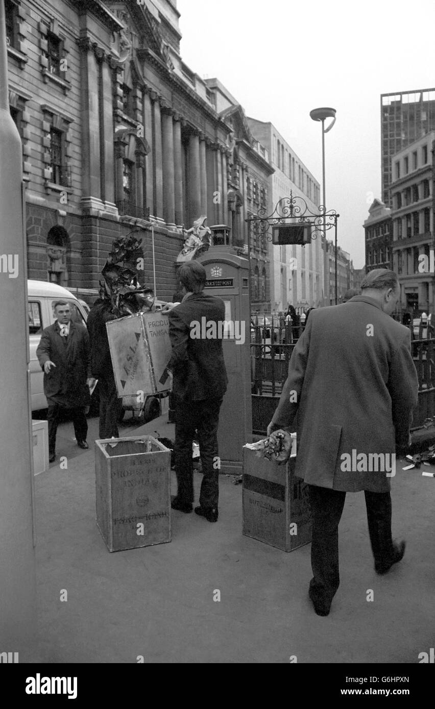 The remains of the car in which a bomb exploded outside the Old Bailey are taken away for inspection. Stock Photo
