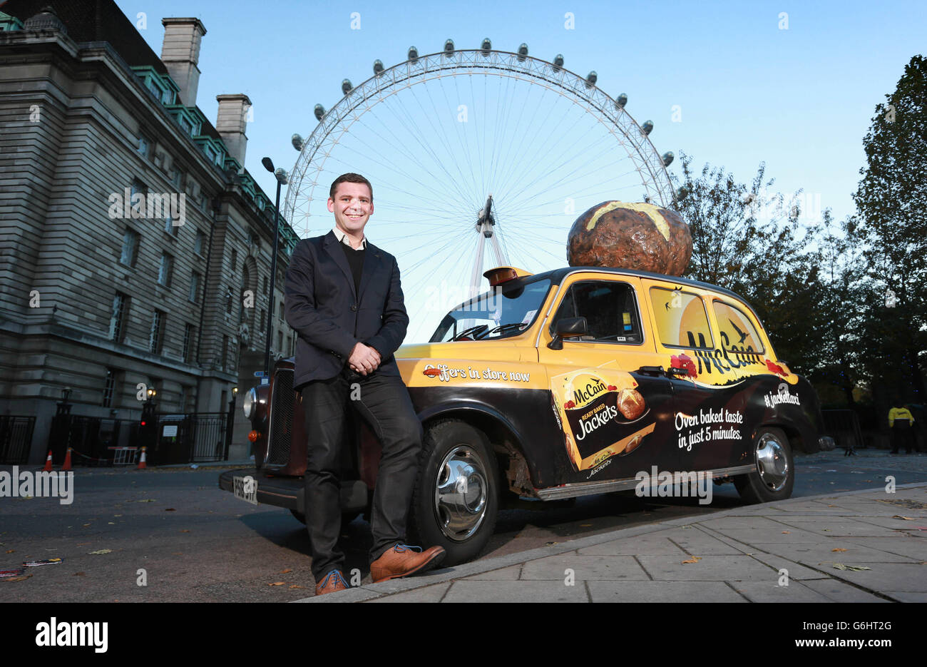 Mark Hodge, Marketing Director McCain GB, at the launch of the McCain Ready Baked Jacket Taxi, a specially modified taxi with built in potato cooking facilities, parked in front of the London Eye in London. Stock Photo