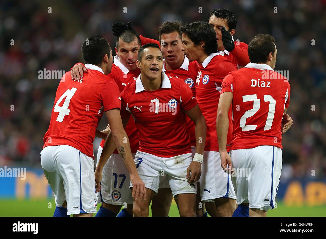 Soccer - International Friendly - England v Chile - Wembley Stadium. Chile's Sanchez Alexis celebrates scoring their first goal of the game with team-mates Stock Photo