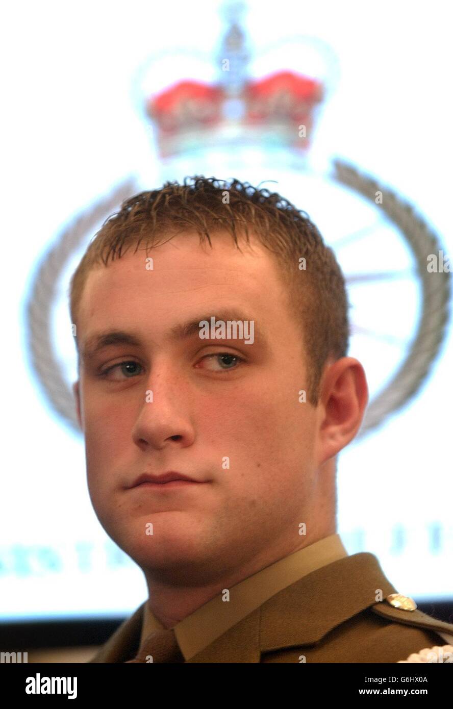 19-year-old Trooper Christopher Finney of the Household Cavalry Mounted Regiment at the Ministry of Defence in London. Trooper Finney has been awarded the George Cross for his work during the recent conflict in Iraq. *26/12/03: Finney is featured in the Queen's Christmas Broadcast which salutes the bravery of British and Australian troops. The 19-year-old, who was awarded the George Cross, is seen chatting with the Queen in the Warrant Officers' Mess at Combermere Barracks in Windsor. Stock Photo