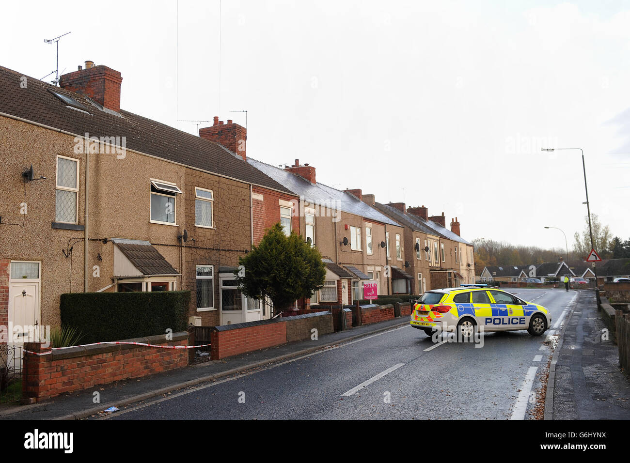 Police at the scene of a house fire on Williamthorpe Road in North Wingfield, Chesterfield