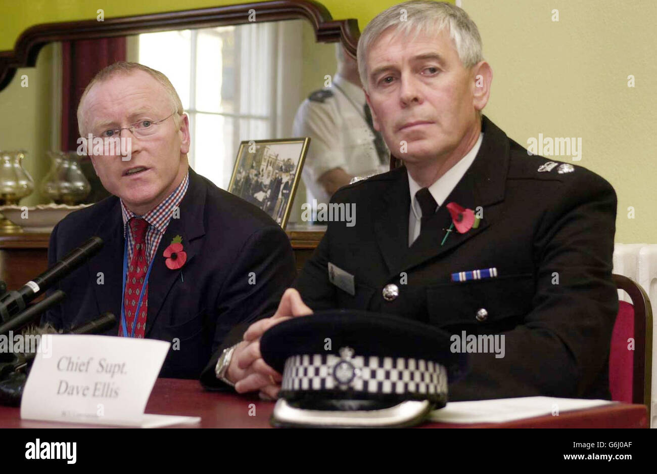 Detective Superintendent Stuart Newberry (left) and Chief Superintendent Dave Ellis attend a press conference in Bodmin Cornwall, after the bodies of a husband and wife were found last night near Wadebridge. A double murder investigation was launched after Carol, 53, and Graham Fisher, 60, were shot dead at close range at their isolated country home in Wadebridge, police said, with a number of shots having been fired in the bungalow. Stock Photo