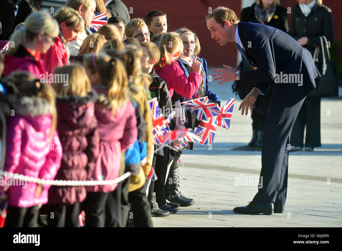 The Duke of Cambridge speaks with children as he arrive at the Haven Point leisure centre in South Shields, Tyne and Wear. Stock Photo