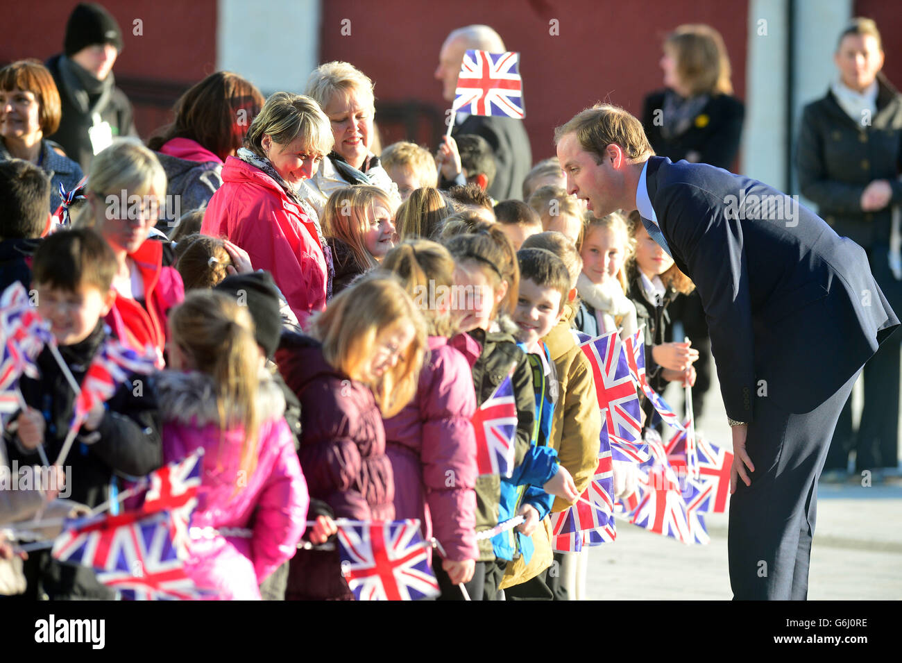 The Duke of Cambridge speaks with children as he arrive at the Haven Point leisure centre in South Shields, Tyne and Wear. Stock Photo