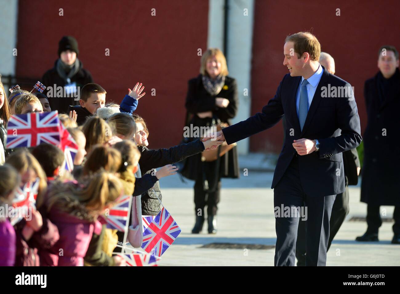 The Duke of Cambridge speaks with children as he arrives at the Haven Point leisure centre in South Shields, Tyne and Wear. Stock Photo