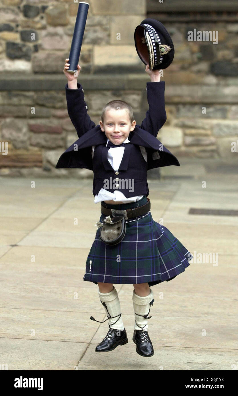 Six-year-old Greig Masson, who was hailed a hero last winter after alerting emergency services and comforting his pregnant mother after her foot was trapped and crushed under a car, received an award for his bravery. The award was presented to him by First Minister Jack McConnell during a ceremony held at the Great Hall, Edinburgh Castle. Stock Photo