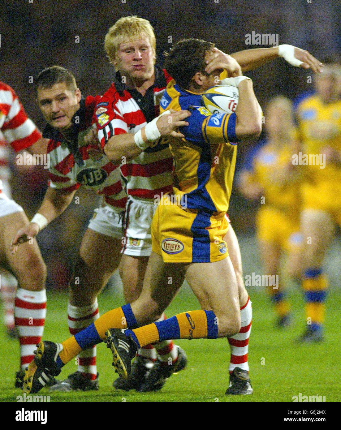 Leeds v Wigan. Leeds Rhinos Danny McGuire is tackled by Wigan Warriors Mick Cassidy, during their Tetleys Super League Semi-Final Eliminator. Stock Photo
