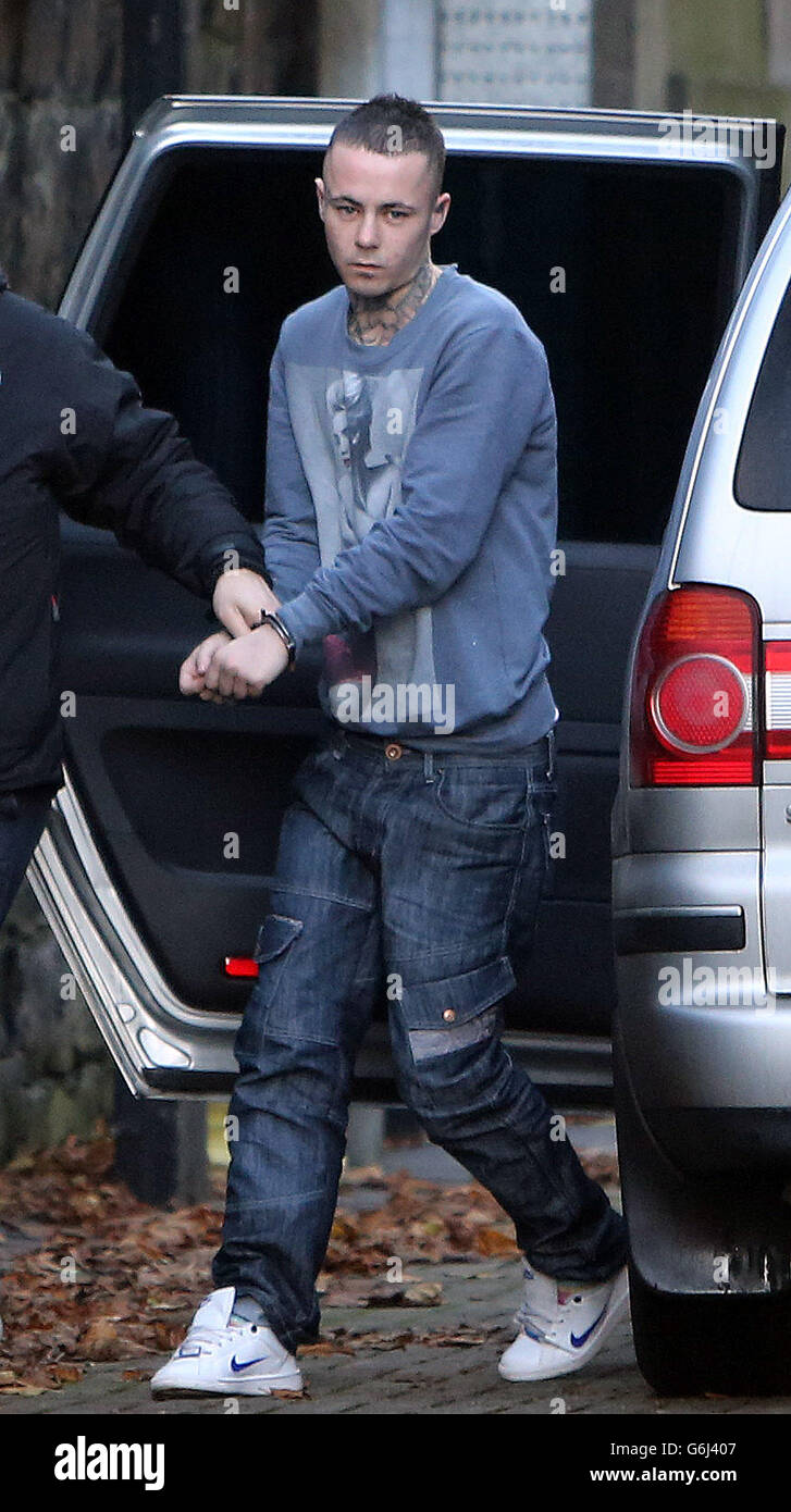Alister Hamiliton, 22, arrives at Ballymena Magistrates' Court, where he faces charges of causing grievous bodily harm, attempted grievous bodily harm and common assault alongside four other defendants after a vulnerable woman with learning difficulties was left traumatised and petrified after her head was shaved while she lay partially clothed and helpless. Stock Photo