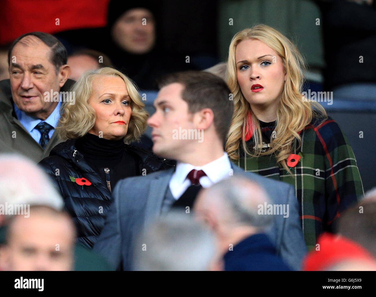 Pamela Moyes, the wife of Manchester United manager David, in the stands with daughter Lauren Moyes (right) Stock Photo