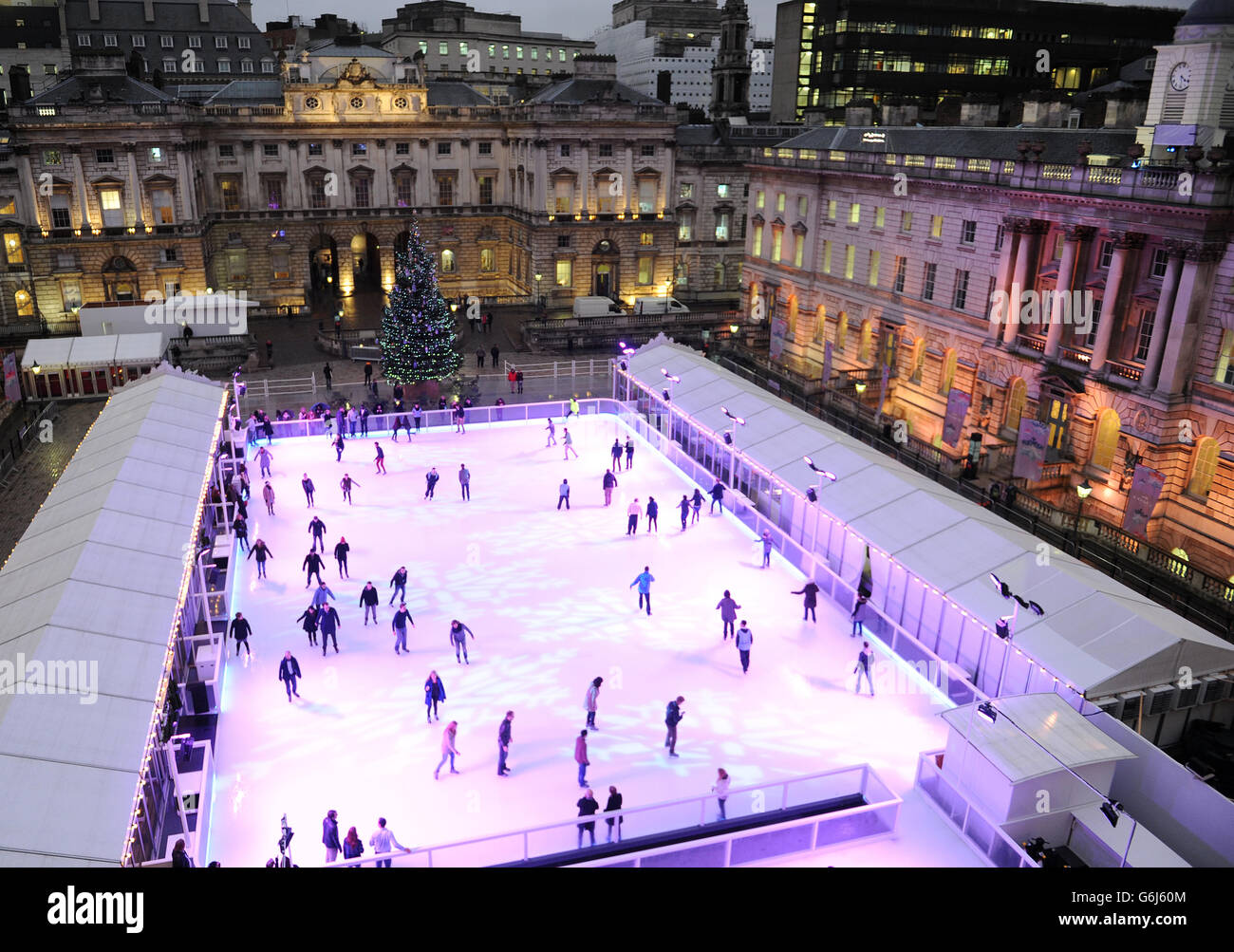 Members of the public on the ice rink at Somerset House. The rink is open from the 14th November to the 5th January. Stock Photo