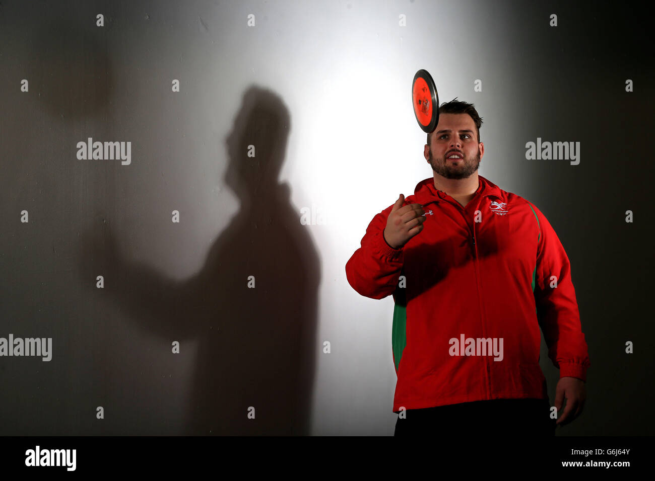 Aled Davies of the Wales discuss Commonwealth team poses for the photographer during the kitting out session at the Millennium Stadium, Cardiff. Stock Photo